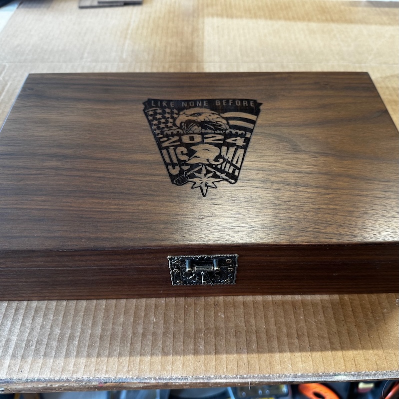 Engraved walnut pistol box
